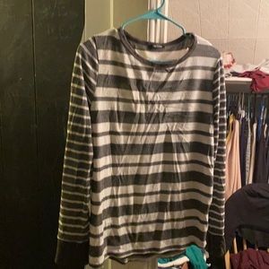 Gray and white striped sweater buttons on sleeves